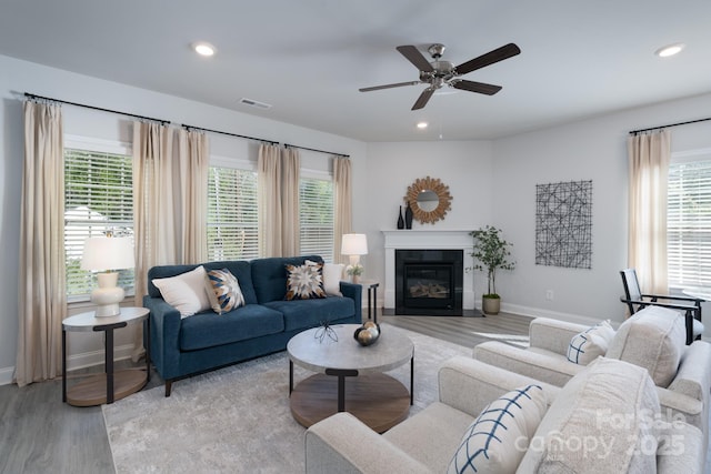 4045 Port Richmond Ave Unit 10, Gastonia, NC 28056 - living room featuring light wood-style flooring, healthy amount of natural light, baseboards, a ceiling fan, and recessed lighting