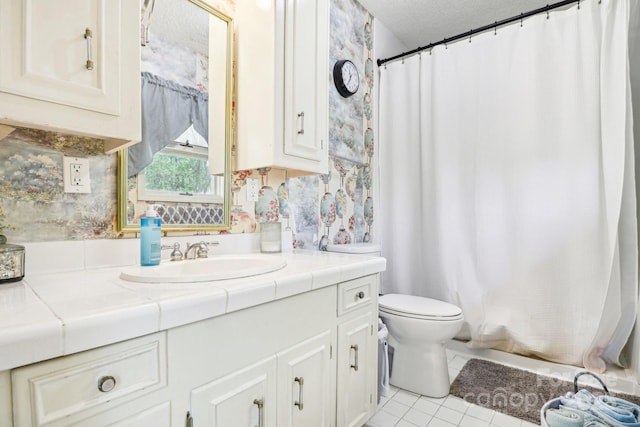 334 Lakeview Cir, Lugoff, SC 29078 - bathroom with wallpapered walls, tile patterned flooring, a textured ceiling, vanity, and toilet