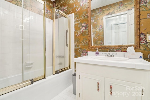 334 Lakeview Cir, Lugoff, SC 29078 - bathroom featuring wallpapered walls, combined bath / shower with glass door, tile patterned flooring, and vanity