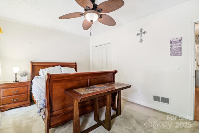334 Lakeview Cir, Lugoff, SC 29078 - bedroom featuring light carpet, crown molding, baseboards, a ceiling fan, and a textured ceiling