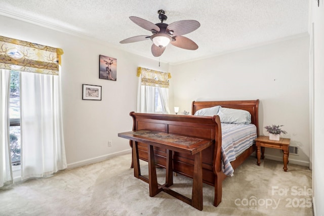 334 Lakeview Cir, Lugoff, SC 29078 - bedroom with ornamental molding, light carpet, a textured ceiling, baseboards, and a ceiling fan