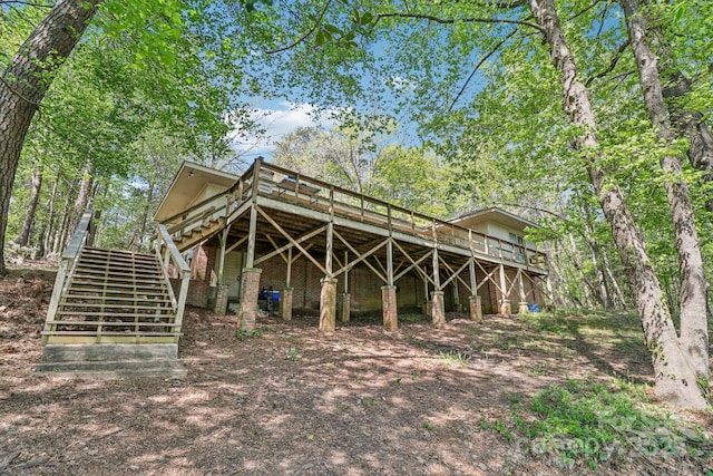 334 Lakeview Cir, Lugoff, SC 29078 - rear view of house with stairway and a deck