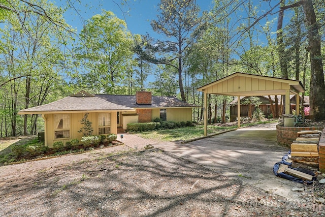 334 Lakeview Cir, Lugoff, SC 29078 - surrounding community with driveway and a detached carport