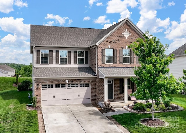 2178 Stone Pile Dr SW, Concord, NC 28025 - traditional-style house featuring a garage, driveway, a front yard, brick siding, and roof with shingles