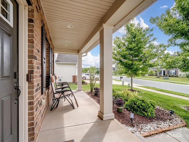 2178 Stone Pile Dr SW, Concord, NC 28025 - view of patio / terrace featuring a porch