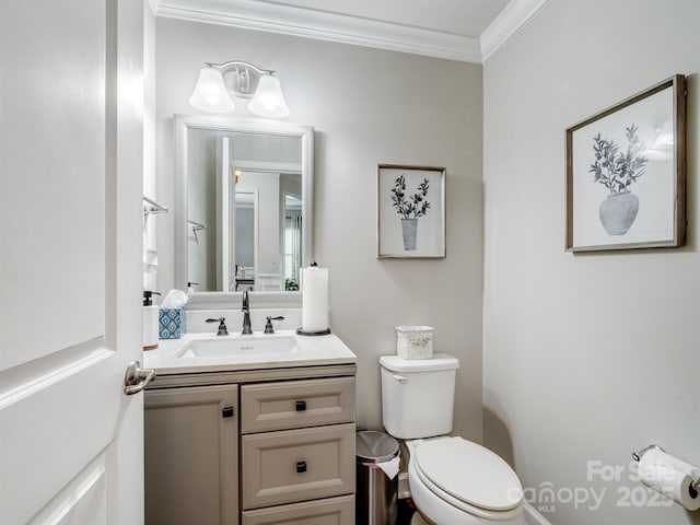 2178 Stone Pile Dr SW, Concord, NC 28025 - half bathroom featuring ornamental molding, toilet, and vanity