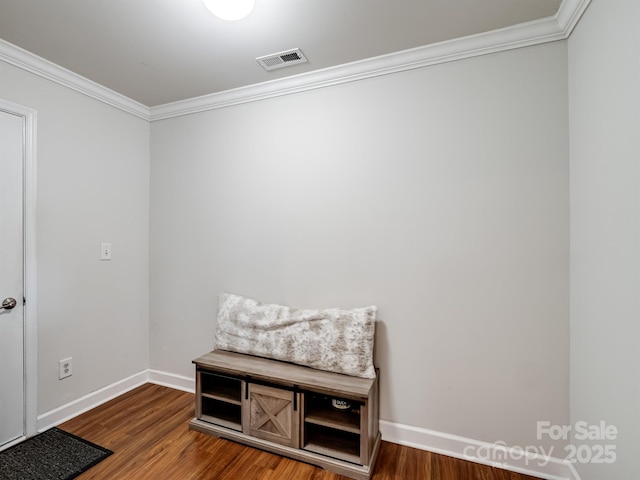 2178 Stone Pile Dr SW, Concord, NC 28025 - sitting room featuring crown molding, wood finished floors, and baseboards