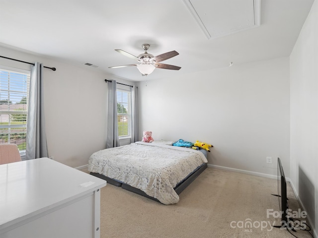2178 Stone Pile Dr SW, Concord, NC 28025 - bedroom with attic access, light carpet, baseboards, and a ceiling fan