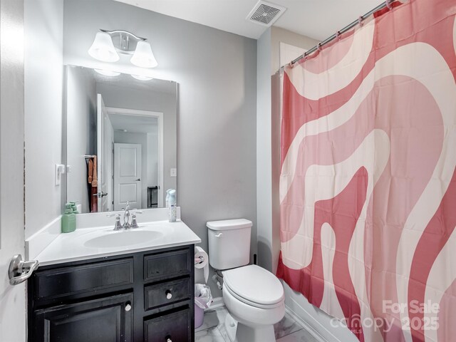 2178 Stone Pile Dr SW, Concord, NC 28025 - full bath featuring vanity, toilet, marble look tile flooring, and a shower with curtain