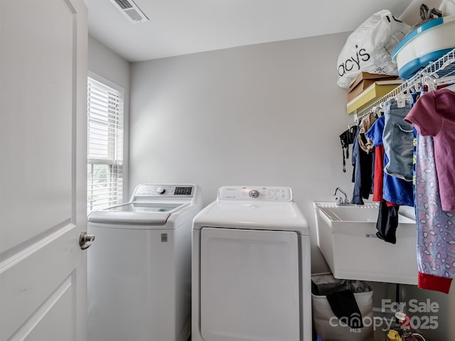 2178 Stone Pile Dr SW, Concord, NC 28025 - clothes washing area featuring independent washer and dryer