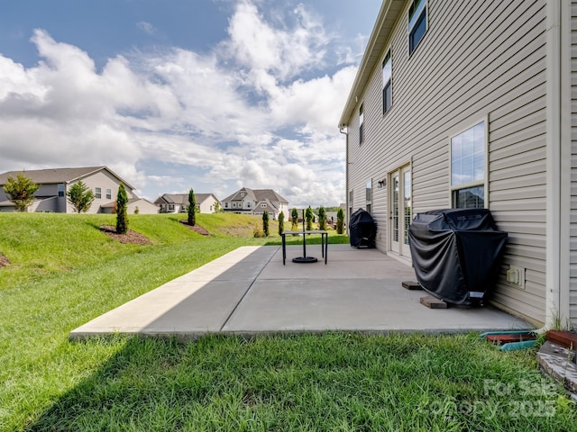 2178 Stone Pile Dr SW, Concord, NC 28025 - view of patio / terrace with a grill, a residential view, and french doors