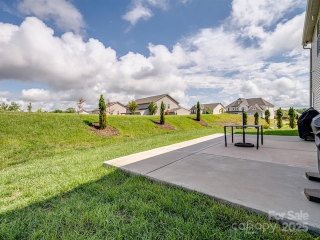 2178 Stone Pile Dr SW, Concord, NC 28025 - view of grassy yard with a patio area and a residential view