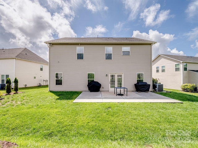 2178 Stone Pile Dr SW, Concord, NC 28025 - rear view of house with a patio, central AC unit, and a lawn