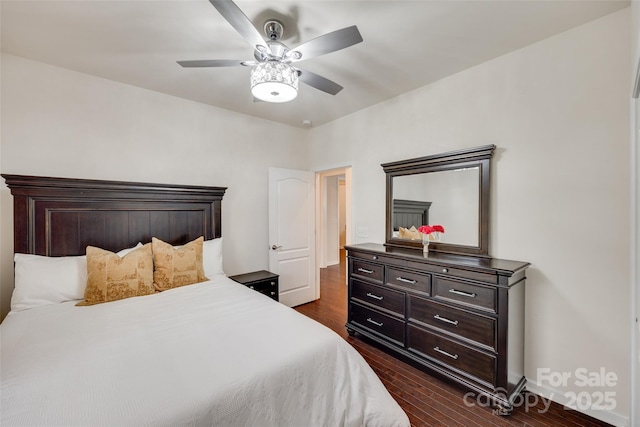 1033 Dorsey Dr, Fort Mill, SC 29715 - bedroom featuring dark wood-style floors, ceiling fan, and baseboards