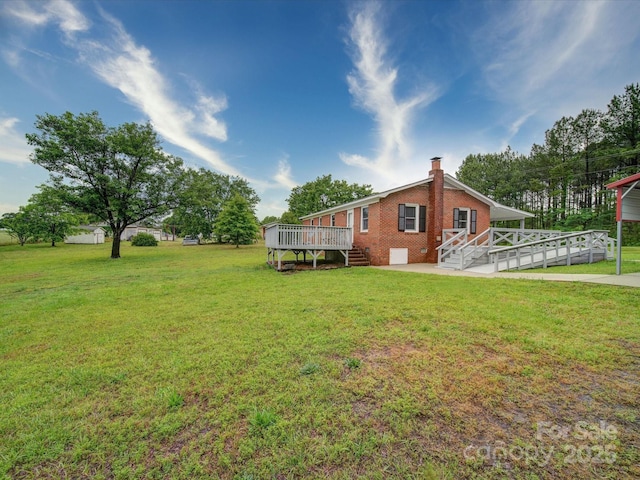1155 Hasty Rd, Peachland, NC 28133 - view of grassy yard featuring a deck