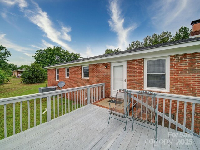 1155 Hasty Rd, Peachland, NC 28133 - deck featuring a lawn and central air condition unit
