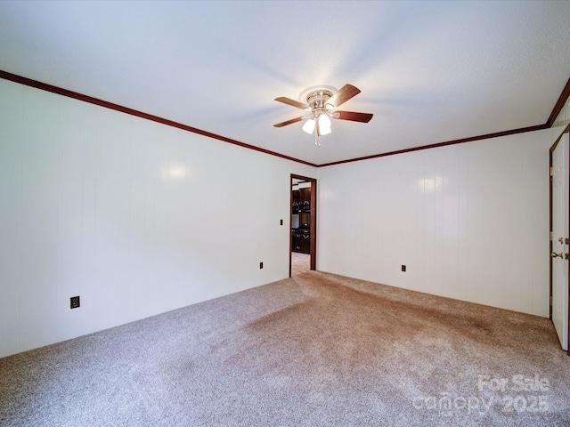 1155 Hasty Rd, Peachland, NC 28133 - spare room with carpet floors, a ceiling fan, and ornamental molding
