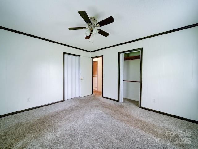 1155 Hasty Rd, Peachland, NC 28133 - unfurnished bedroom featuring carpet floors, ornamental molding, ceiling fan, and baseboards