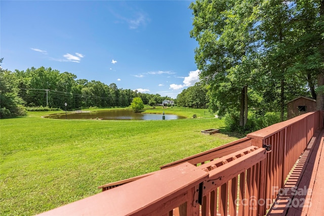 6504 Sybil Ct, Indian Trail, NC 28079 - deck with a water view, a yard, and view of scattered trees