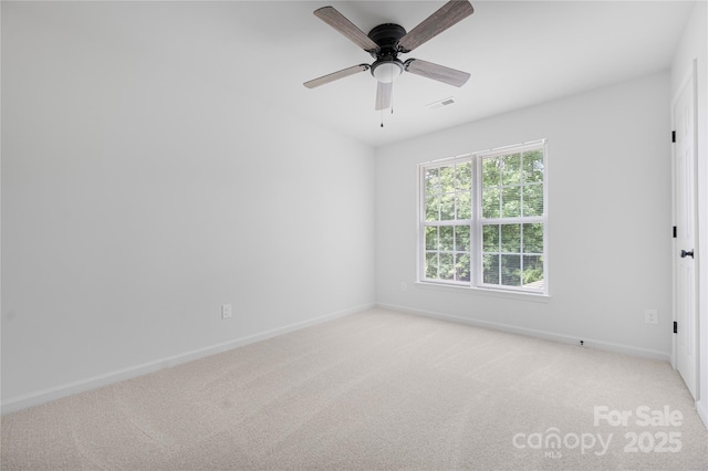 6504 Sybil Ct, Indian Trail, NC 28079 - empty room featuring baseboards, light carpet, and ceiling fan