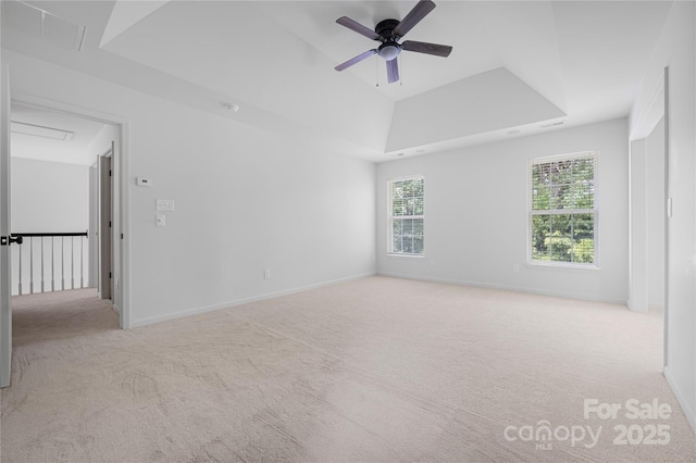 6504 Sybil Ct, Indian Trail, NC 28079 - carpeted empty room featuring attic access, ceiling fan, a tray ceiling, and baseboards