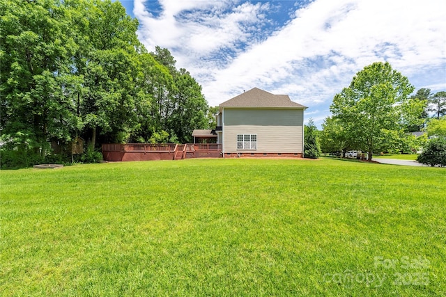 6504 Sybil Ct, Indian Trail, NC 28079 - view of grassy yard with a wooden deck