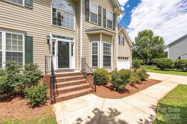 6504 Sybil Ct, Indian Trail, NC 28079 - doorway to property featuring a garage and concrete driveway