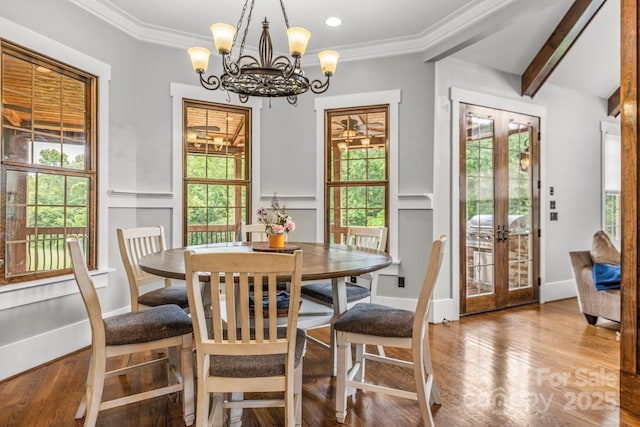270 Sandhills Ct, Mooresville, NC 28115 - dining space with french doors, a chandelier, plenty of natural light, crown molding, and wood finished floors