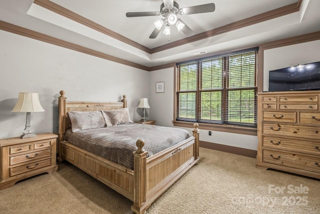 270 Sandhills Ct, Mooresville, NC 28115 - bedroom featuring a raised ceiling, light colored carpet, ornamental molding, baseboards, and a ceiling fan