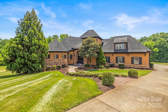 270 Sandhills Ct, Mooresville, NC 28115 - view of front of home with stone siding and a front yard