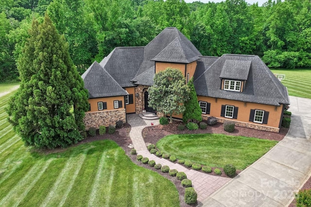 270 Sandhills Ct, Mooresville, NC 28115 - view of front facade featuring stone siding, a front lawn, and roof with shingles