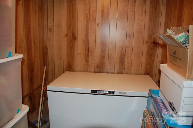 interior space featuring wood walls