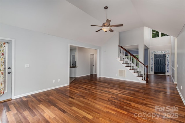 17318 Cambridge Grove Dr, Huntersville, NC 28078 - unfurnished living room featuring stairs, wood finished floors, a ceiling fan, high vaulted ceiling, and baseboards