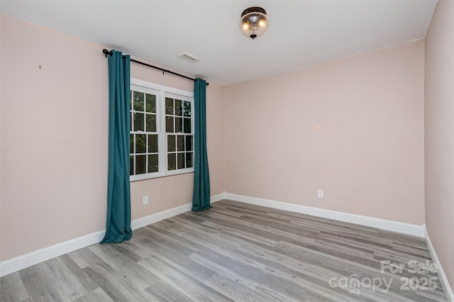 17318 Cambridge Grove Dr, Huntersville, NC 28078 - unfurnished room with wood finished floors and baseboards