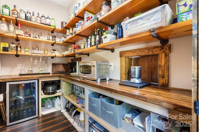 pantry featuring wine cooler