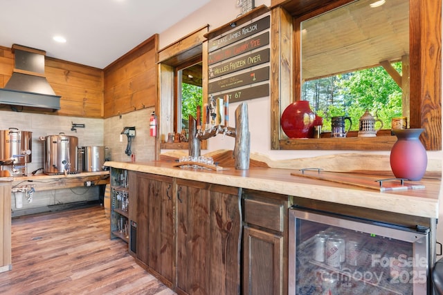 2775 Campbells Trce, Nebo, NC 28761 - kitchen with beverage cooler, wood finished floors, light countertops, and recessed lighting