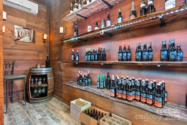 2775 Campbells Trce, Nebo, NC 28761 - indoor dry bar with an AC wall unit, wood finished floors, and wood walls