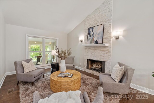 1096 Palmyra Dr, Tega Cay, SC 29708 - living room with a fireplace, wood finished floors, and high vaulted ceiling