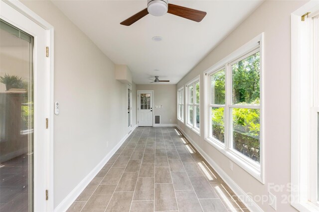1096 Palmyra Dr, Tega Cay, SC 29708 - unfurnished sunroom with baseboards