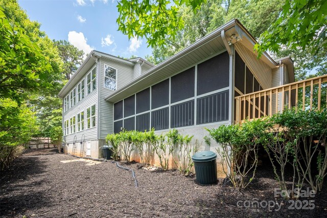 1096 Palmyra Dr, Tega Cay, SC 29708 - view of side of home with a sunroom and crawl space
