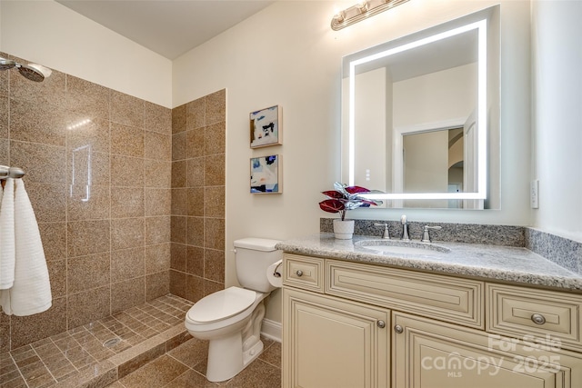 3911 Sandy Point Dr, York, SC 29745 - bathroom featuring toilet, tiled shower, and vanity