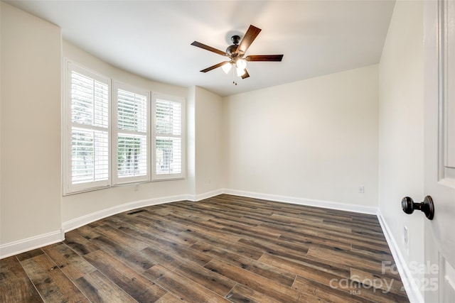 3911 Sandy Point Dr, York, SC 29745 - spare room with ceiling fan, dark wood-style floors, and baseboards