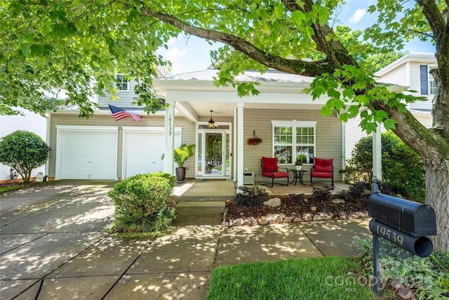 19539 Denae Lynn Dr, Cornelius, NC 28031 - view of front of home with covered porch, driveway, and a garage