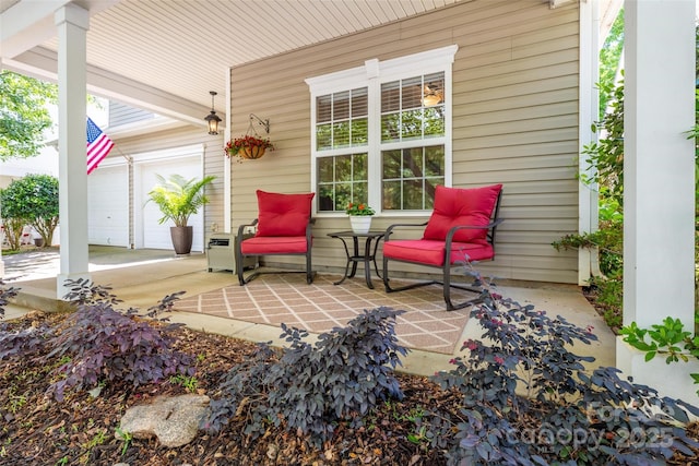 19539 Denae Lynn Dr, Cornelius, NC 28031 - porch with a garage and concrete driveway
