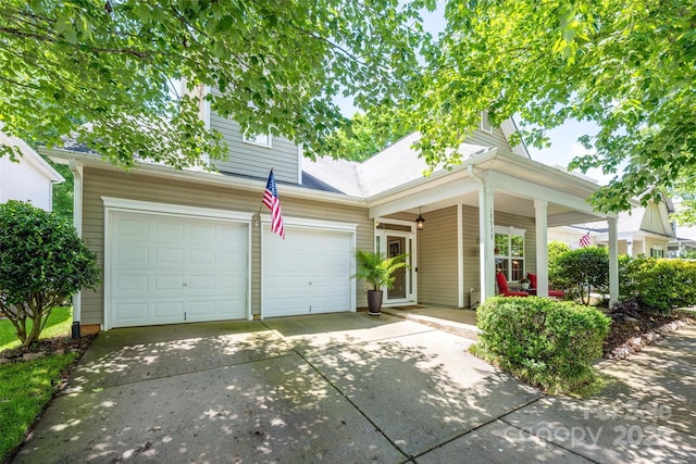 19539 Denae Lynn Dr, Cornelius, NC 28031 - view of front of home with covered porch, driveway, and a garage