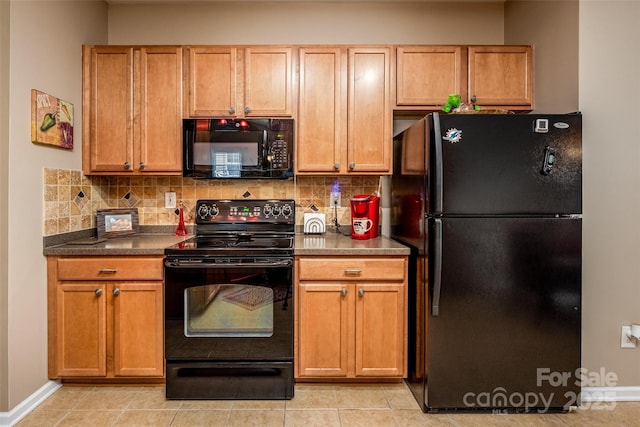 19539 Denae Lynn Dr, Cornelius, NC 28031 - kitchen with black appliances, decorative backsplash, baseboards, and dark countertops
