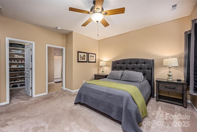 19539 Denae Lynn Dr, Cornelius, NC 28031 - carpeted bedroom featuring a spacious closet, baseboards, a ceiling fan, and a closet