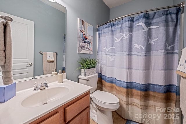 19539 Denae Lynn Dr, Cornelius, NC 28031 - bathroom featuring vanity, toilet, tile patterned flooring, and a shower with shower curtain