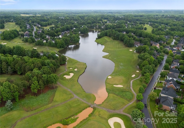 aerial perspective of suburban area with a large body of water and a local golf course