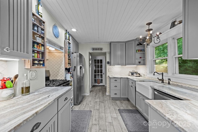 3905 NC Highway 213, Marshall, NC 28753 - kitchen featuring gray cabinets, ventilation hood, stainless steel fridge with ice dispenser, open shelves, and tasteful backsplash